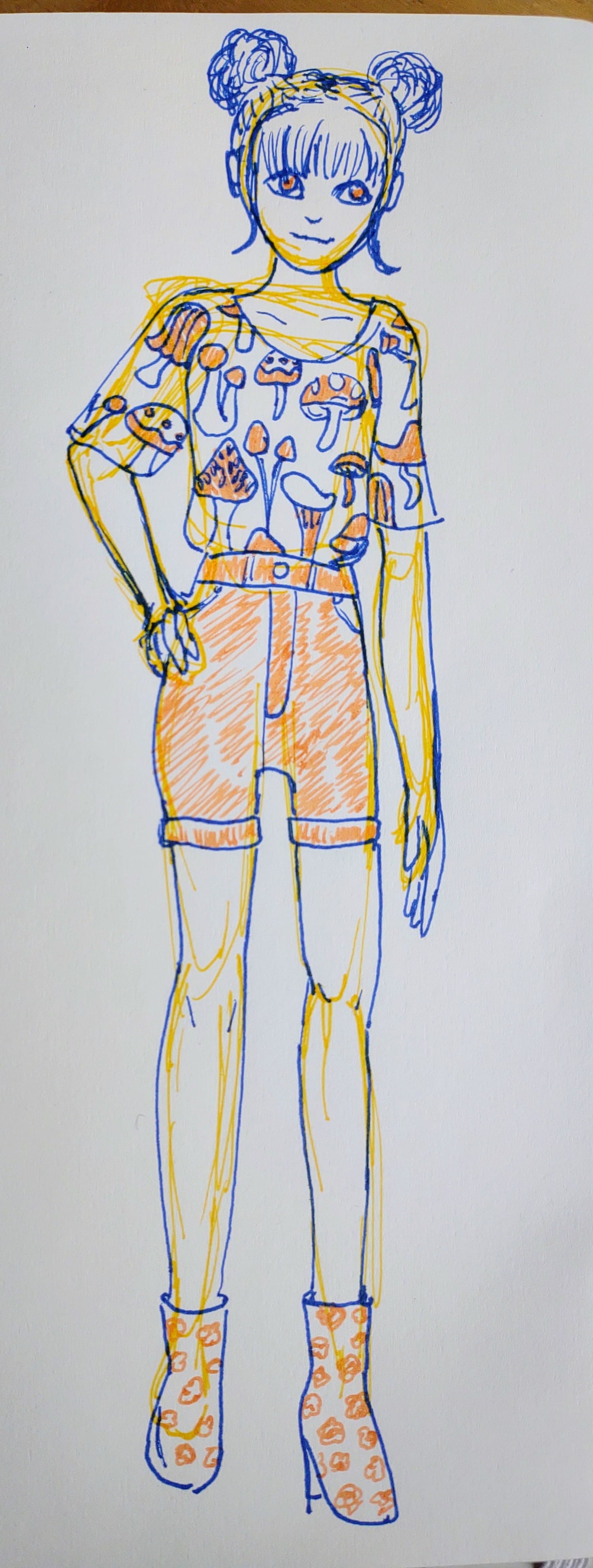 Drawing of a girl with her hair up in two buns, wearing a tee shirt with a pattern of many different kinds of mushroom, high waisted jean shorts, and high heeled boots with a floral pattern. She's standing with her hand on her hip and smiling slightly. There is a rough bottom layer of the sketch in yellow pen, the main lines are in blue pen, and the details of the clothing are colored with orange pen. 